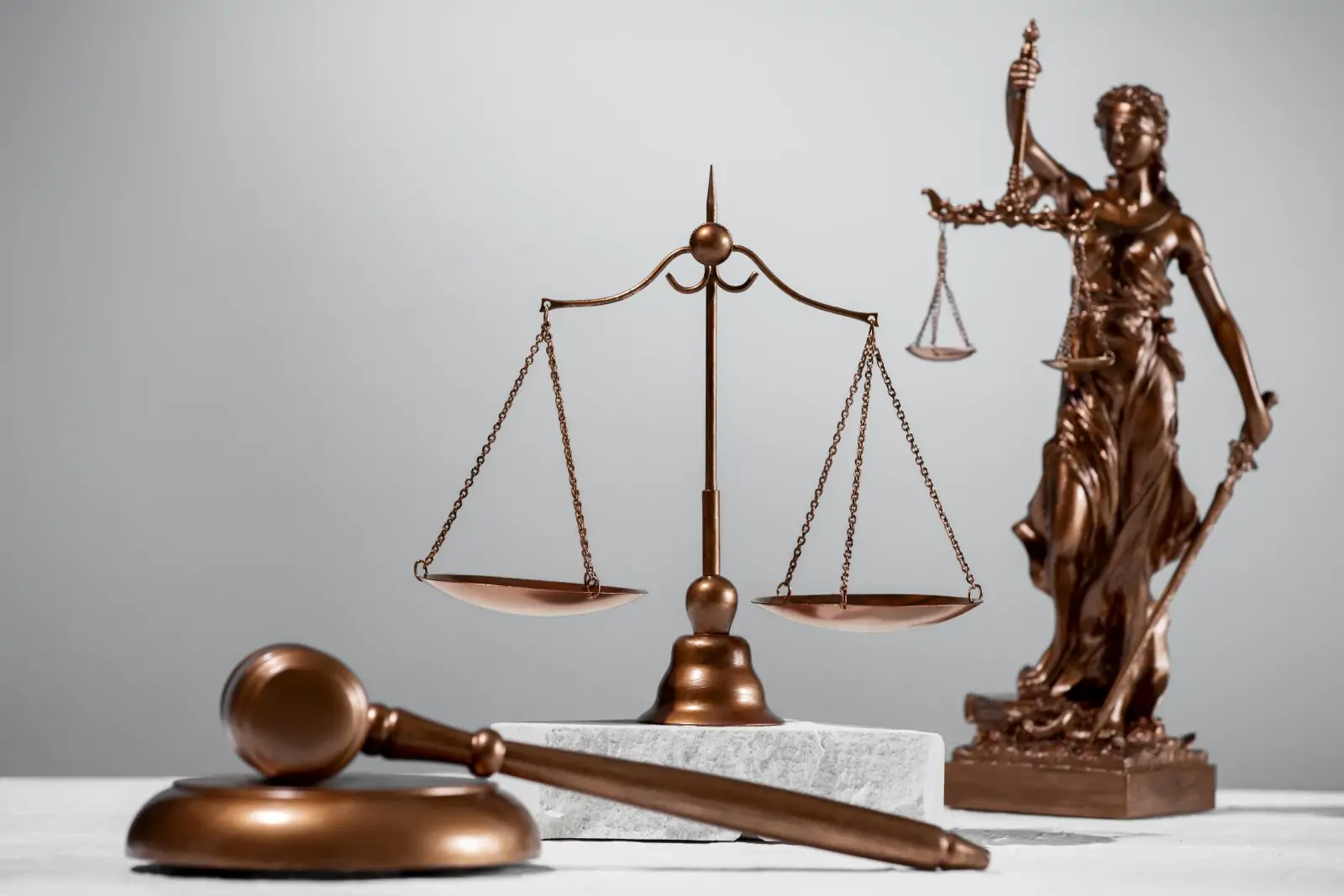 Legal and judiciary professionals reviewing case documents